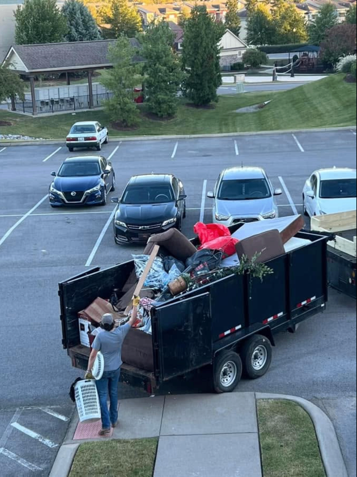 Loaded Trash Ninja trailer during a junk removal job